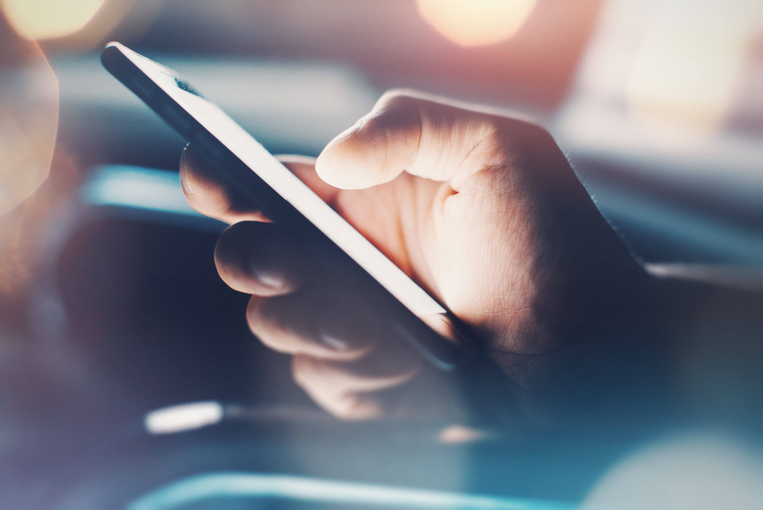 A person holding a smartphone